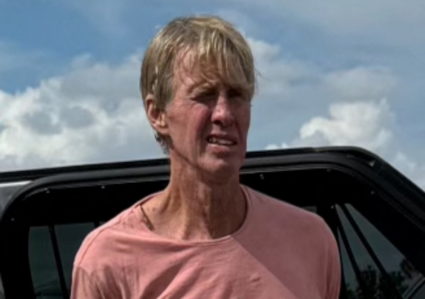 Suspected Trump golf course gunman Ryan W. Routh stands handcuffed after his arrest during a traffic stop near Palm City