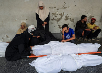 Funeral of Palestinians killed in an overnight Israeli air strike on an UNRWA school, in Gaza City