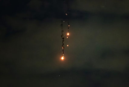 Ukraine says it struck a Russian air base as Russia launched hundreds of drones into Ukraine