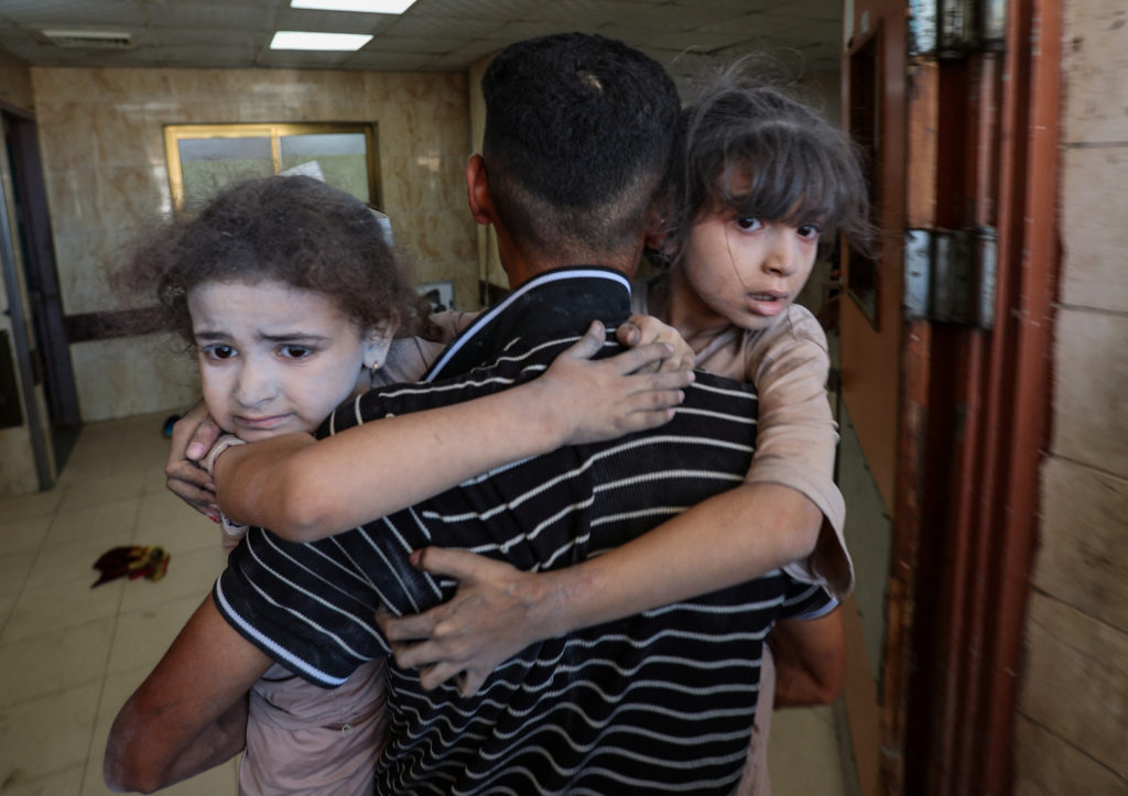 Wounded Palestinians receive treatment at Al-Aqsa Martyrs Hospital in Deir al-Balah