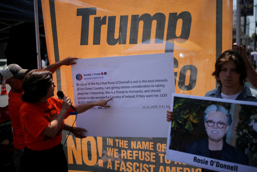 Protesters denounce U.S. President Trump for threatening to strip comedian Rosie O’Donnell of her citizenship, in Los Ange...