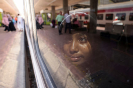 Sudanese families displaced by conflict return home voluntarily from Egypt to Sudan, on a special train, coordinated by th...