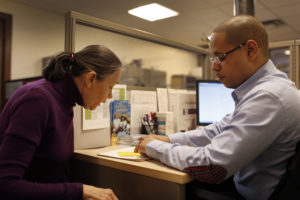 Fifty-four-years-old Natalia Pollack, uninsured since 1999, is helped to sign up for health insurance through the Affordab...