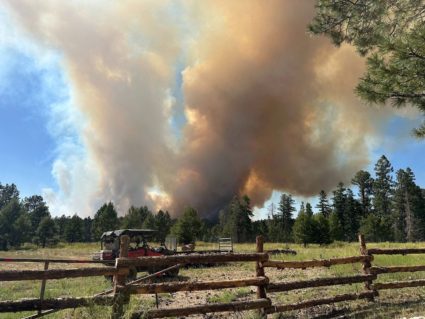 Smoke billows over the Grand Canyon