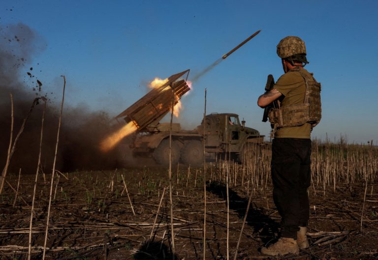 FILE PHOTO: Ukrainian servicemen fire a Grad MLRS towards Russian troops near the frontline town of Pokrovsk
