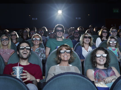 People watching a movie at a theater