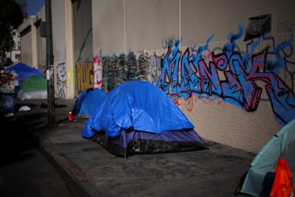 Tents are pitched on a sidewalk in Skid Row, Los Angeles