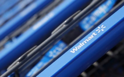 Shopping carts are seen outside a new Walmart Express store in Chicago