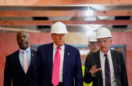 Trump ramps up pressure on Powell to cut interest rates during visit to Federal Reserve