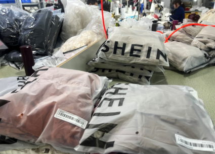 Packs of clothing are pictured at a garment factory for Shein in Guangzhou