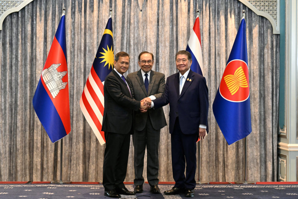 Malaysia's Prime Minister Ibrahim, Cambodia's Prime Minister Manet and Thailand's acting Prime Minister Wechayachai take p...