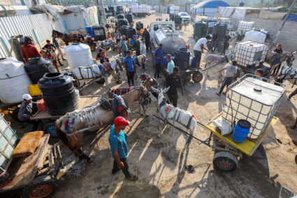 Dozens killed seeking aid in Gaza as Israel considers further military action