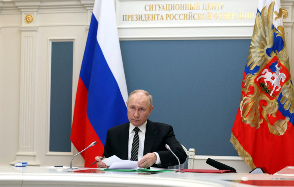 FILE PHOTO: Russian President Putin inspects an exercise to test delivering a massive retaliatory nuclear strike, via a vi...