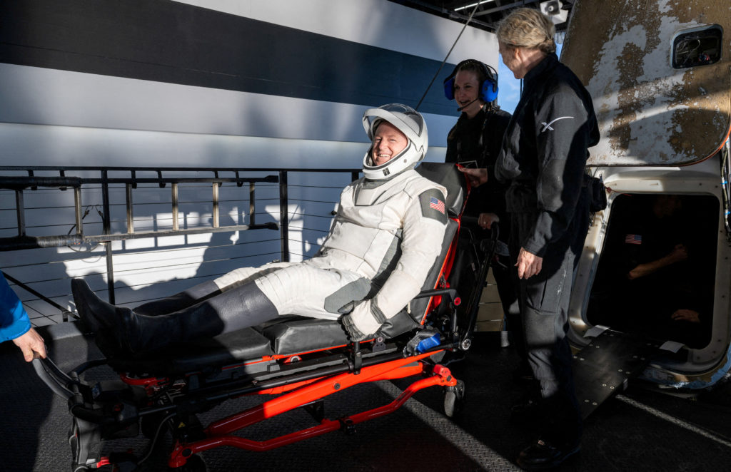 FILE PHOTO: Astronauts Butch Wilmore and Suni Williams return to earth in a Crew Dragon capsule