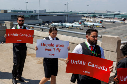Air Canada flight attendants hold a picket outside Toronto Pearson International Airport