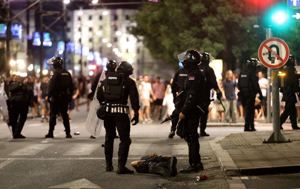 Serbia's police intervene to end standoff between ruling party supporters and anti-government protesters in Belgrade