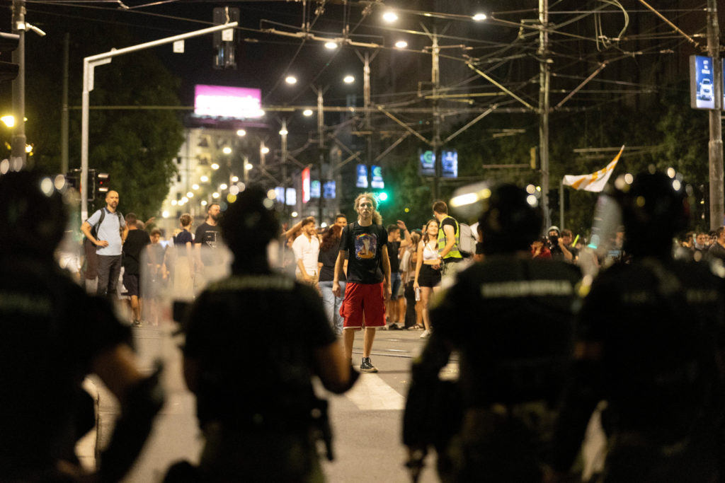 Serbia's police officers intervene to end standoff between ruling party supporters and anti-government protesters in Belgrade