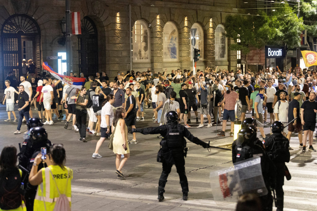 Serbia's police officers intervene to end standoff between ruling party supporters and anti-government protesters in Belgrade