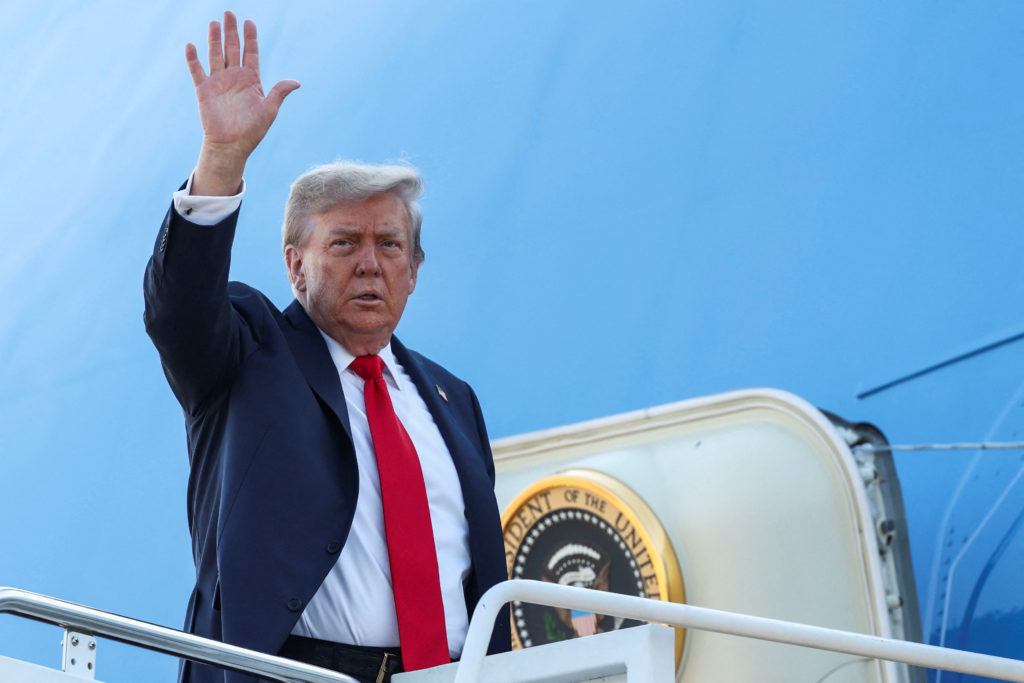 U.S. President Trump boards Air Force One as he departs for Alaska to meet with Russian President Putin