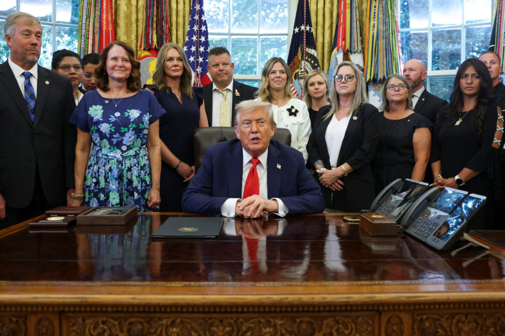 U.S. President Donald Trump meets with relatives of members of the U.S. military killed in Afghanistan in 2021 at the Whit...