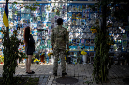 Peace efforts in limbo as Ukraine's capital mourns 23 dead after Russian attack