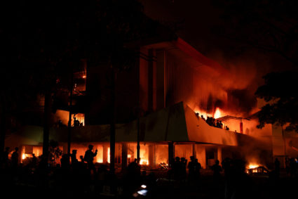 Protest after a motorcycle taxi driver died after being struck and run over by a police tactical vehicle during Thursday's...