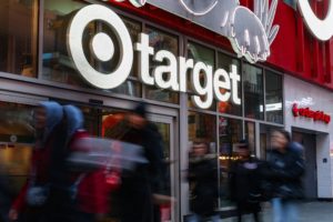 People walk by a Target store in midtown Manhattan in New York