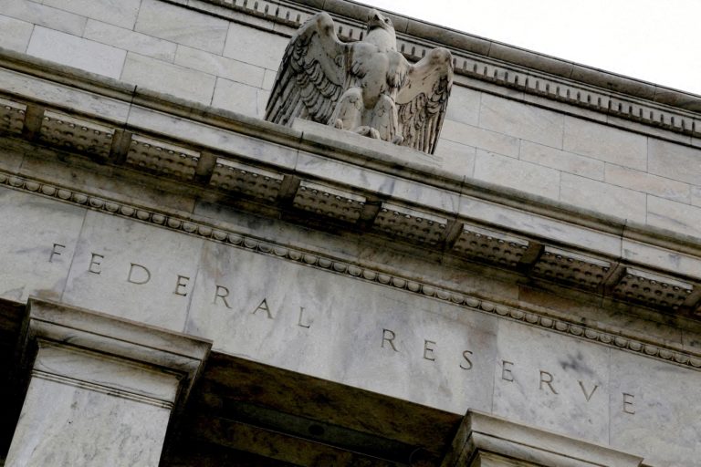FILE PHOTO: An eagle tops the U.S. Federal Reserve building's facade in WashingtonAn