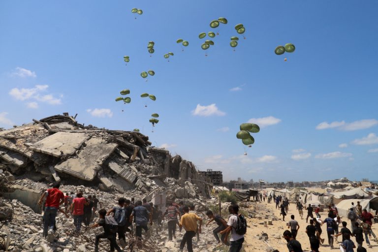 Aid packages are airdropped over Gaza
