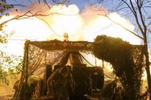 Ukrainian serviceman fires a howitzer towards Russian troops in a front line in Donetsk region
