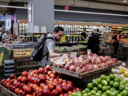 A person shops for groceries in New York City