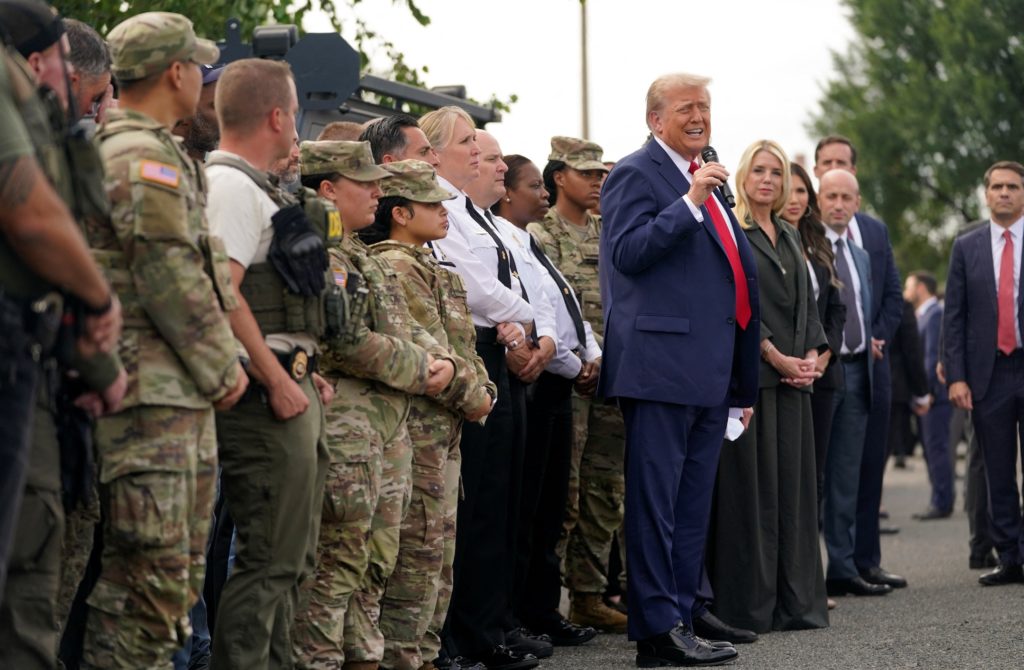 News Wrap: Pentagon says troops will start carrying firearms in D.C.