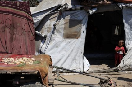 Palestinians displaced by the Israeli military offensive take shelter in tents, in Gaza City