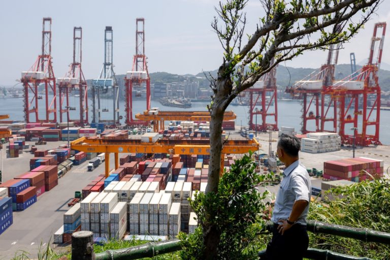 Containers and equipment sit at the Port of Keelung