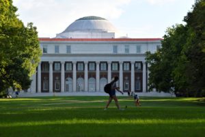 Students crossing the lawn in front of the Faye and Joe Wyatt Center for Education on the campus of Peabody College at Van...