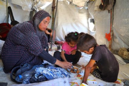 Palestinian mother recounts struggle to get food aid to four hungry children in Gaza City