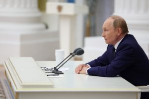 Russian President Vladimir Putin holds a meeting with members of Russia's top leadership in preparation for the upcoming R...