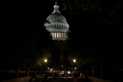 Tourists tour around the U.S. Capitol, in Washington