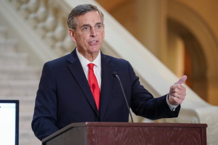 Twenty 10-sided dice are rolled to determine the random selection of audited presidential election ballot batches in Atlanta