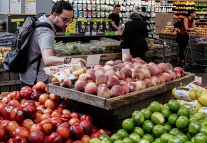 A person shops for groceries in New York City