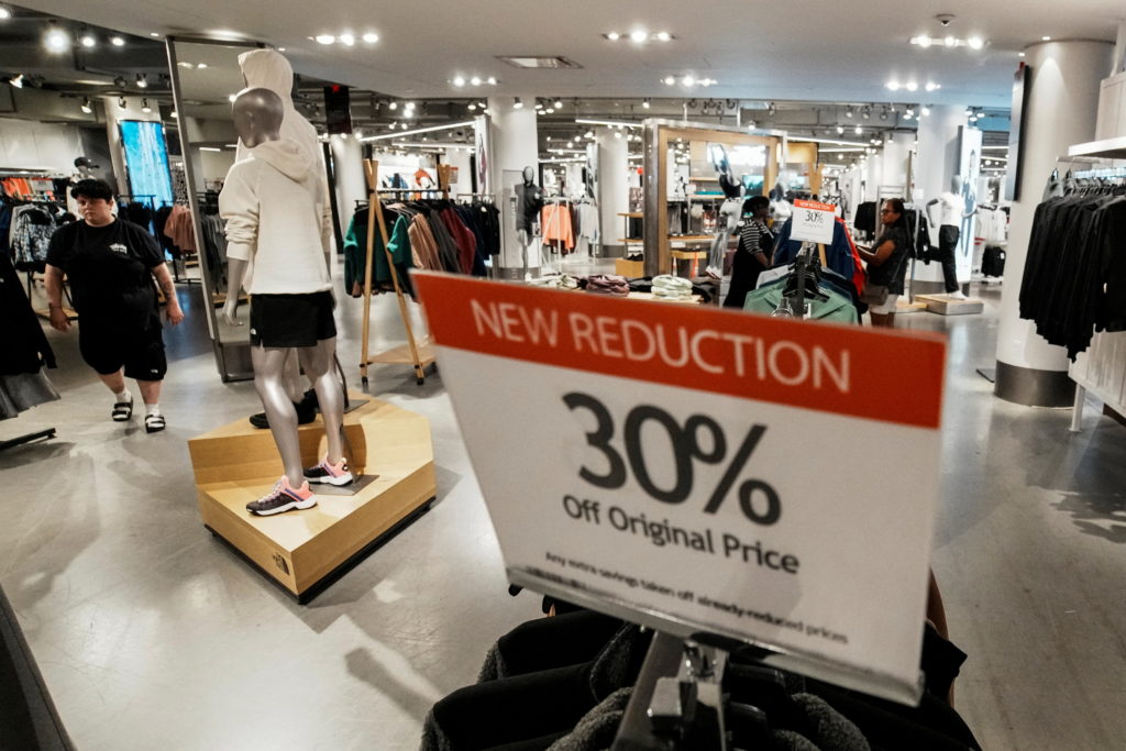 People shop at Macy’s department store in Manhattan in New York