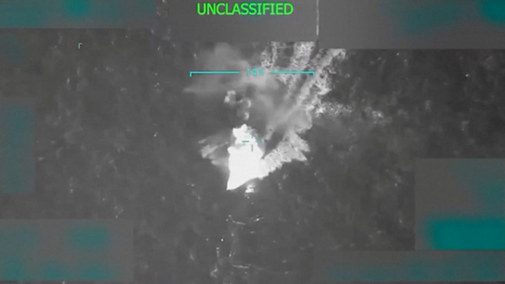 A vessel, which U.S. President Trump said was transporting illegal narcotics and heading to the U.S., is struck by the U.S...