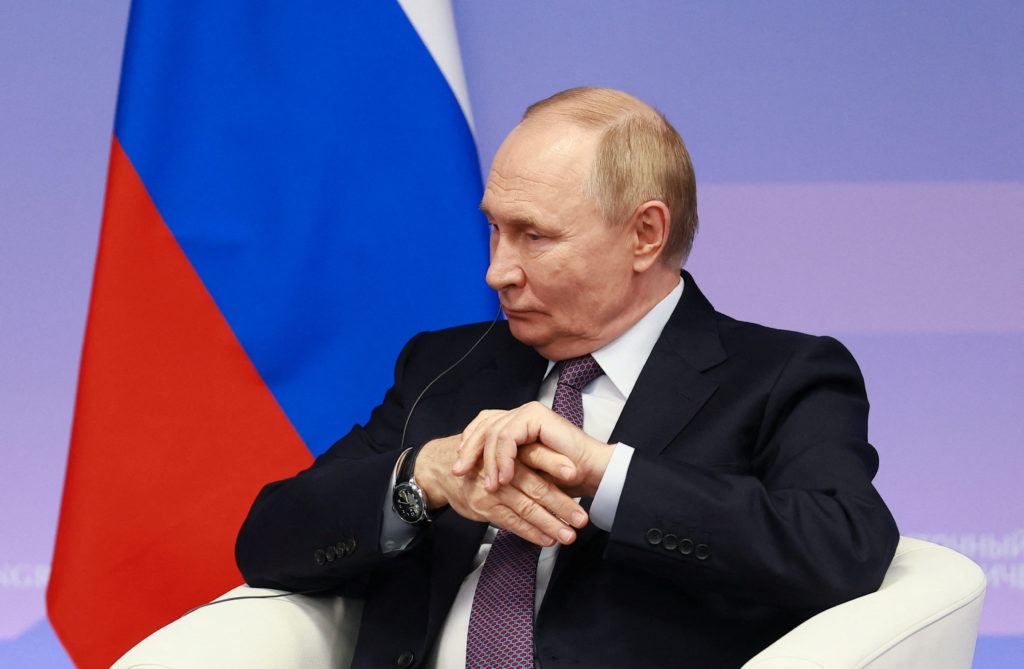 Russia's President Vladimir Putin and Vice Chairman of China's NPC Standing Committee Li Hongzhong meet in Vladivostok