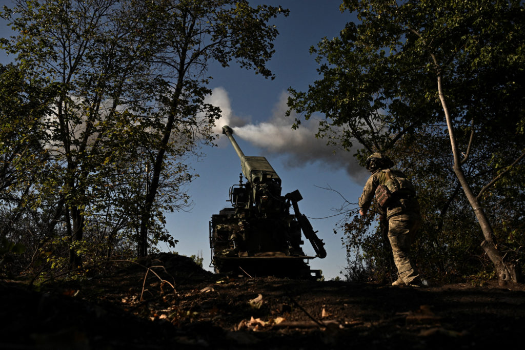 Ukrainian serviceman fires a self-propelled howitzer towards Russian troops at a position in a front line in Zaporizhzhia ...