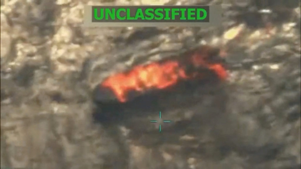 A vessel burns in this still image taken from a video depicting what U.S. President Trump said was a U.S. military strike ...