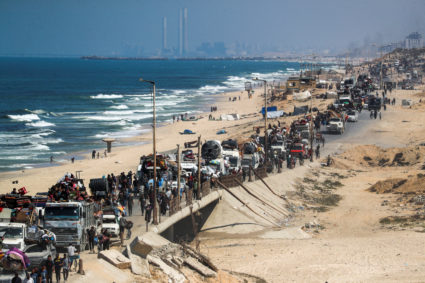 Displaced Palestinians move southward after Israeli forces ordered residents of Gaza City to evacuate to the south