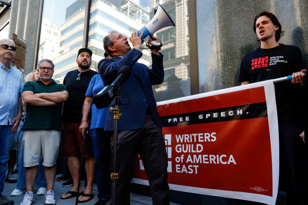 People rally in front of ABC Studios to protest "Jimmy Kimmel Live!" being taken off the air, in New York
