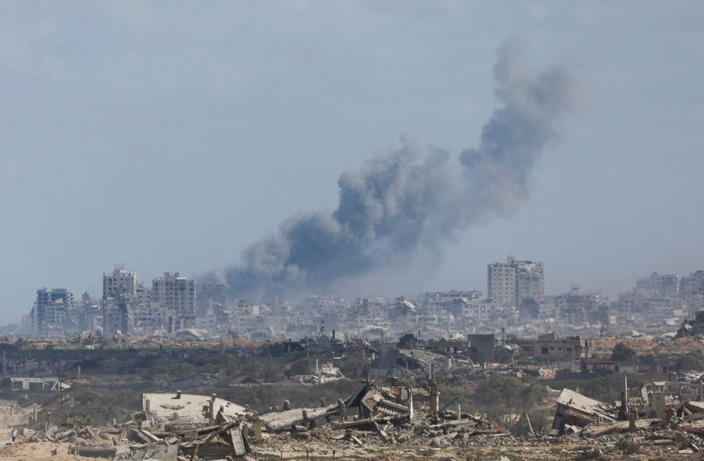 Smoke rises following an Israeli strike, as seen from the central Gaza Strip