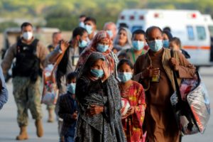 Afghan evacuees from Kabul arrive at Naval Station (NAVSTA) Rota Air Base, in Rota