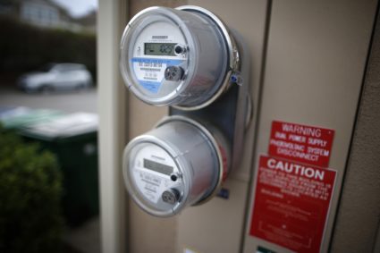 Dual electricity meters are seen outside a home in Irvine, California
